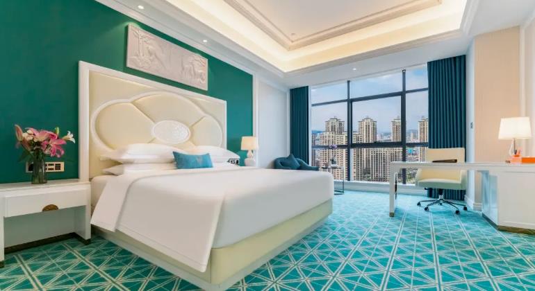 Assemble at Shenzhen Futian Port (take metro) > Shenzhen North Station (take high-speed train) > Transfer via Guangzhou South (take high-speed train) > Guangxi "Baise" > Lingnan Architectural Gem [Yuedong Guild Hall]：Baise [Golden Bauhinia Star Hotel] - Guest Room
